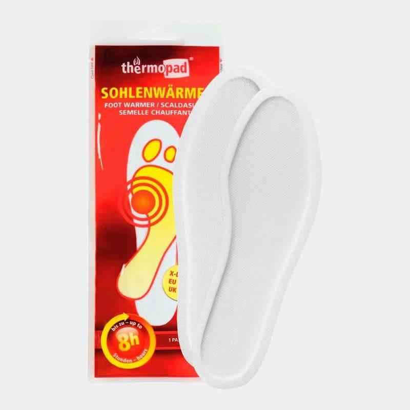 Calentador de pies Thermopad con almohadilla blanca y empaque rojo
